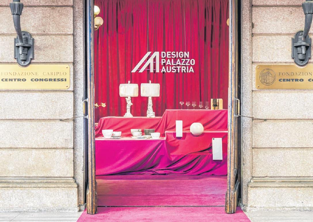 Entrance view of the Design Palazzo Austria exhibition in Milan, showcasing contemporary Austrian design pieces