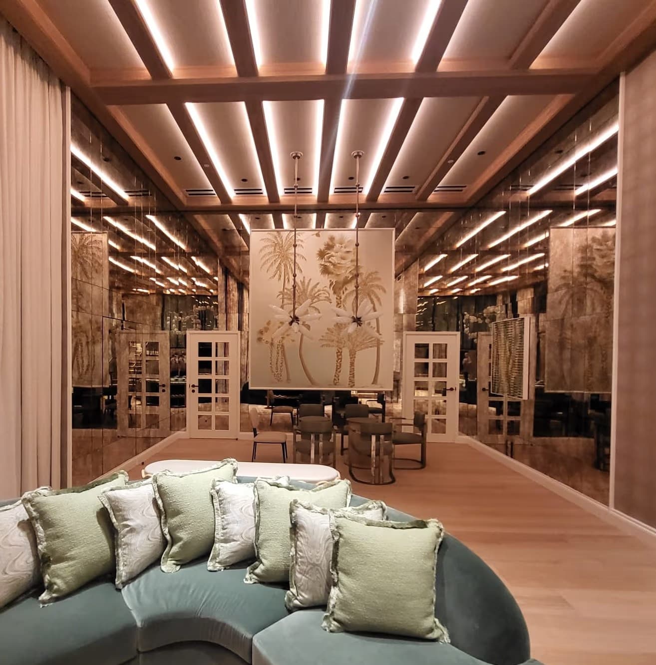 Palm garden terrace at Palmhouse Florida with atmospheric Muza Lab lighting