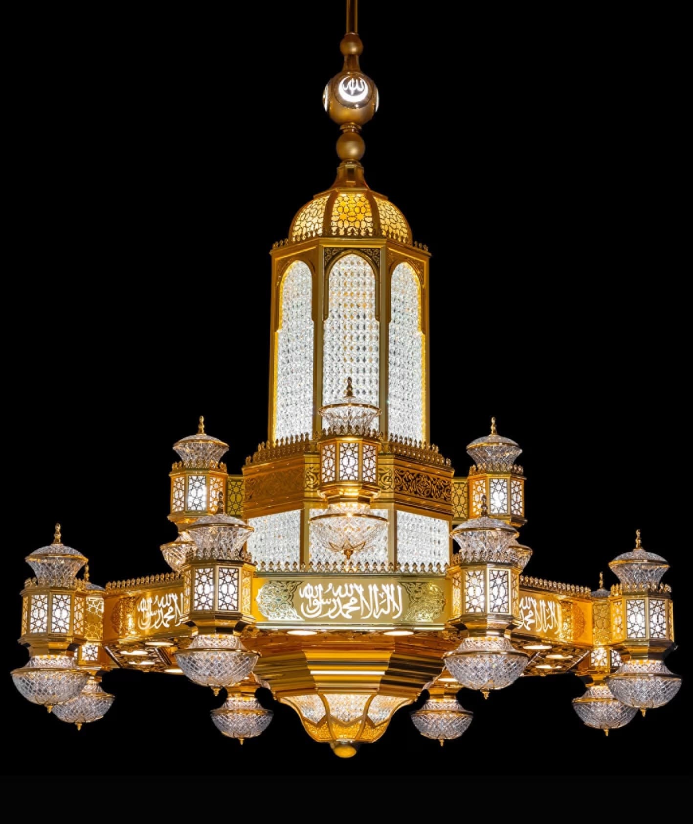 Golden Islamic chandelier with detailed craftsmanship in the Prophet’s Mosque, Medina